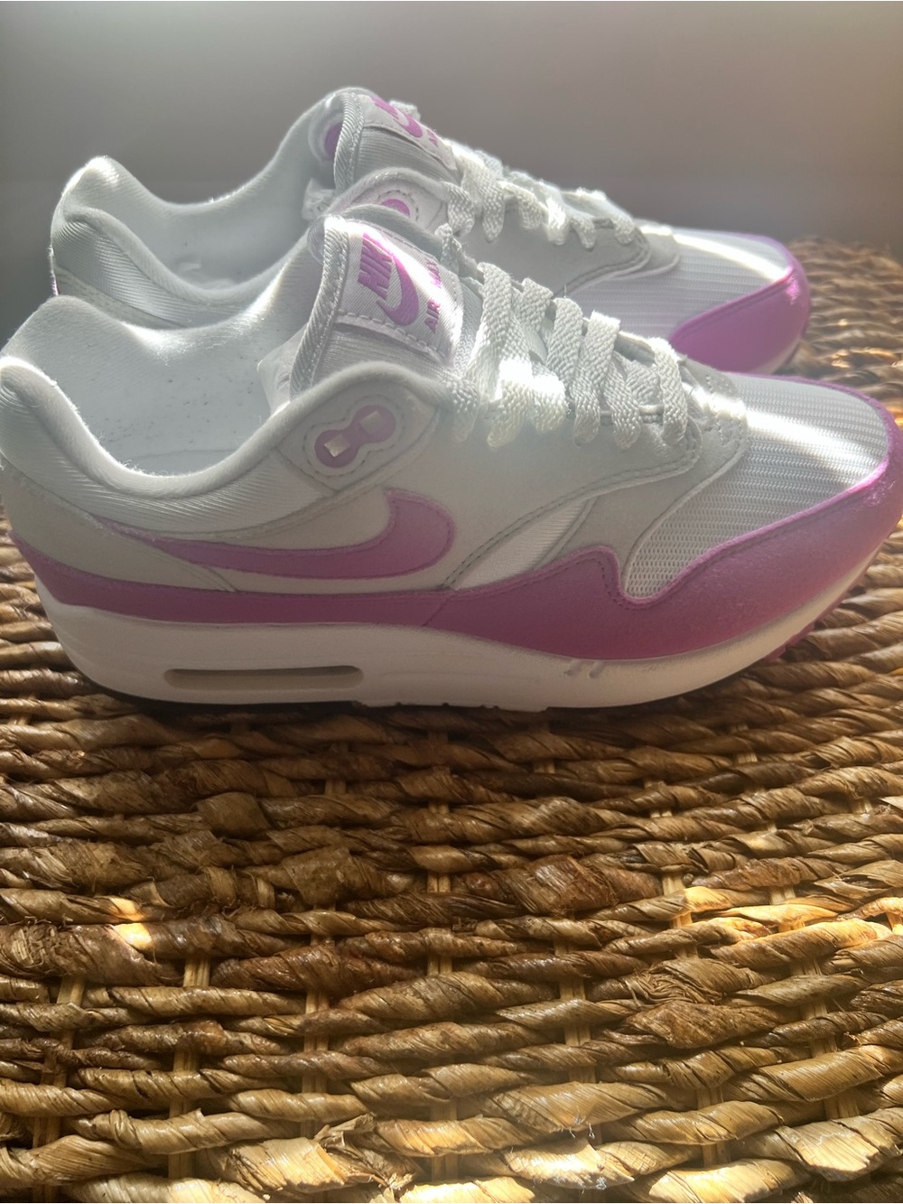 Nike Women’s White and Pink Air Max 1 Sneakers